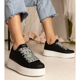 Schwarze Frauen -Turnschuhe mit massiver Schnürung = 1