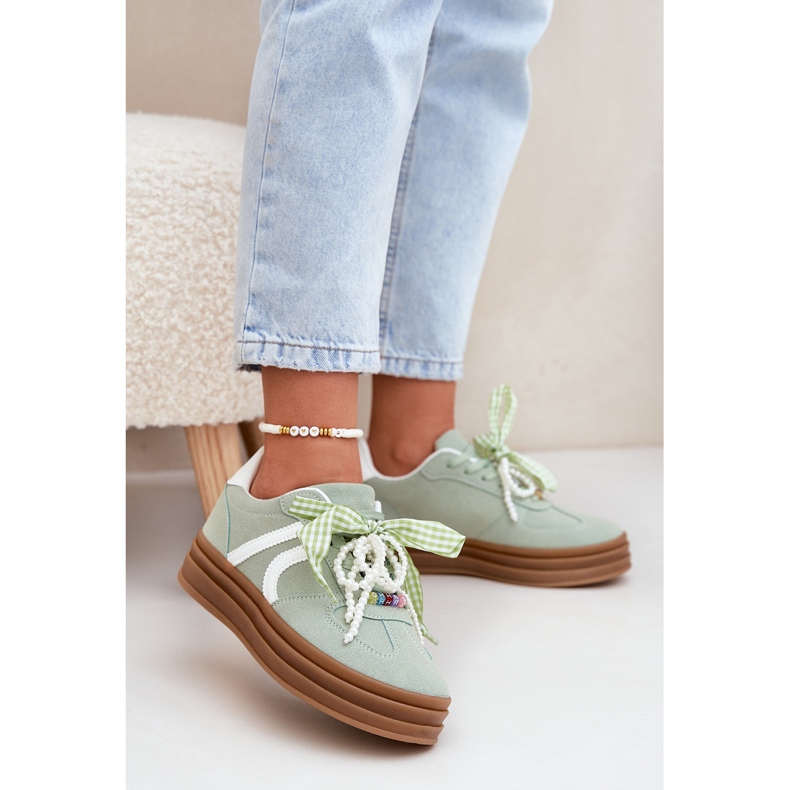 Frauen -Sneaker auf der Plattform mit grünen Ornamenten 2