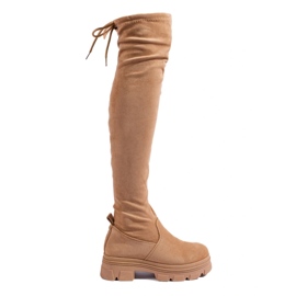 Oberschenkelhohe Damenstiefel auf beigefarbenem Plateau 1