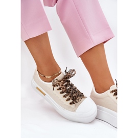 Frauen -Sneaker auf einer massiven Plattform mit dekorativem Schnürsenkel Beige 2
