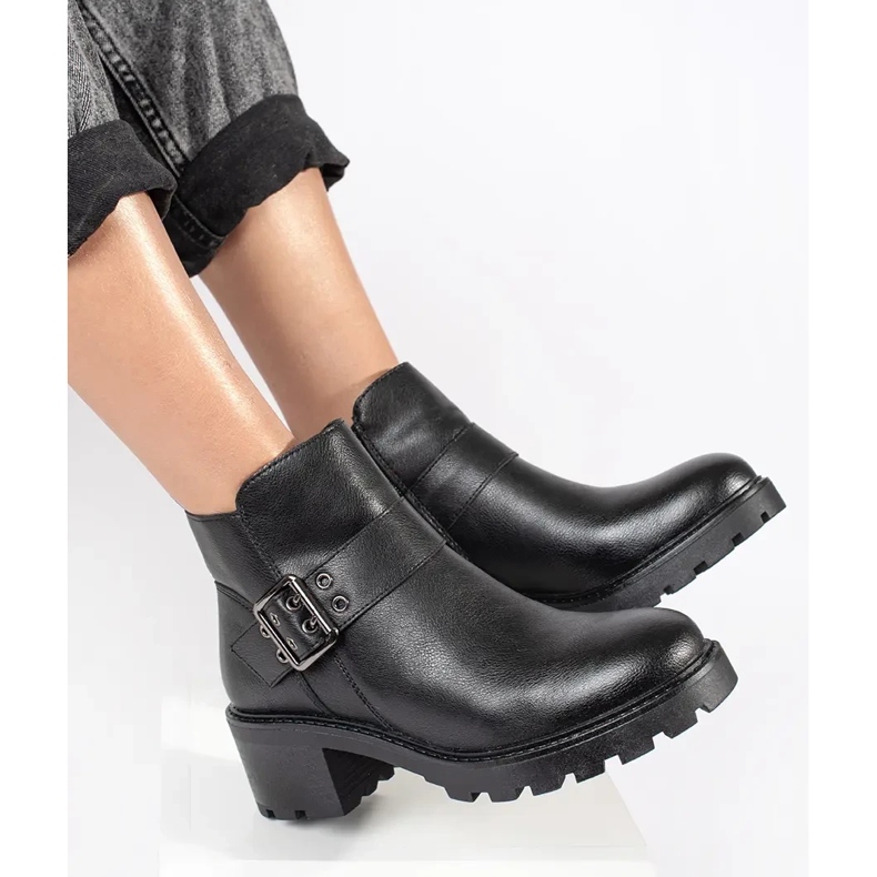 Schwarze Damen-Stiefeletten aus Leder mit hohem Absatz und dekorativer Schnalle von Sergio Leone 1