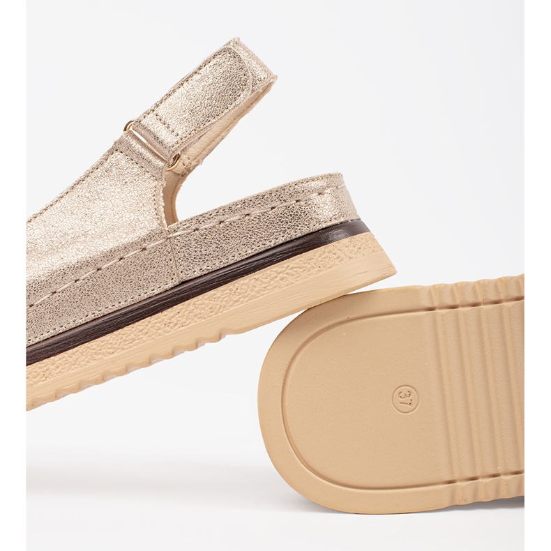 Goodin Goldsandalen auf der Plattform mit einem Stift golden 1
