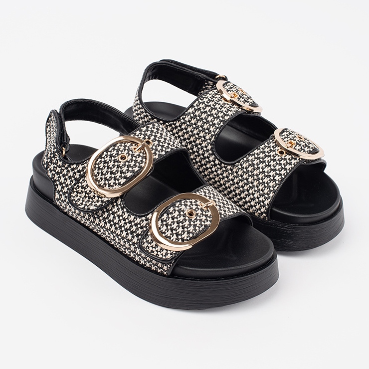 Goodin Sandalen auf einer schwarzen und weißen Plattform 1