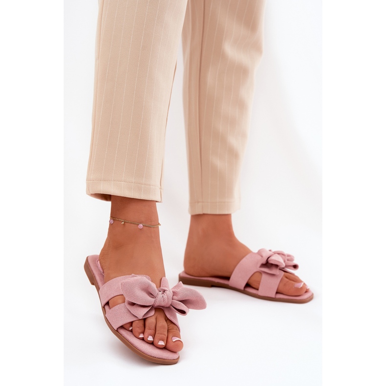 Flat -Frauen -Flip -Flops mit einem rosa Bogen 2