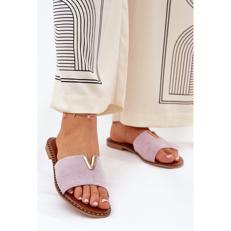 Flach -heftige Frauen -Flip -Flops mit dekorativen lila Details 2