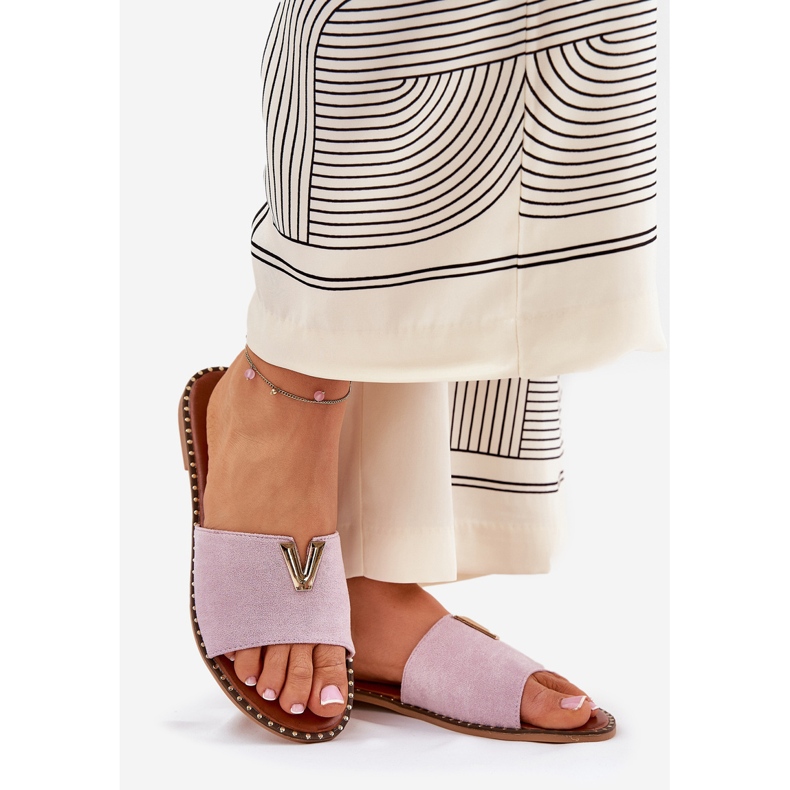 Flach -heftige Frauen -Flip -Flops mit dekorativen lila Details 1