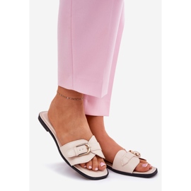 Flat -Frauen -Flip -Flops mit einer goldenen beige Klemme 1