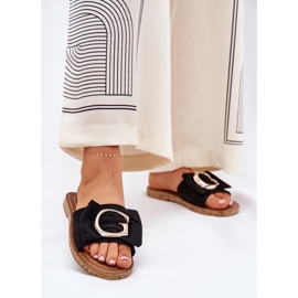 Flat -Frauen -Flip -Flops mit einem dekorativen Detail schwarz 2