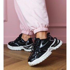 Schwarze Sport -Turnschuhe auf einer stilvollen Sohle 2