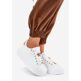 Frauen -Sneaker auf der Plattform mit weißen Stiften 1