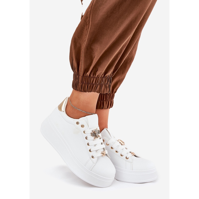 Frauen -Sneaker auf der Plattform mit weißen Stiften 1