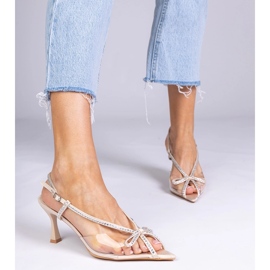 Beige transparente Sandalen auf einem Stift mit Zirkonen 2