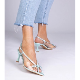 Grüne transparente Sandalen auf einem Stift mit Zirkonen 2