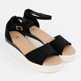 Seastar Schwarze Frauensandalen auf einem weißen Keil 1