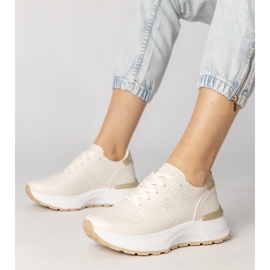 Beige Sportsneaker mit goldenem Einfügen 1