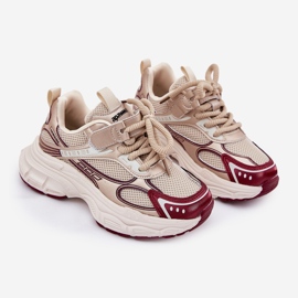 Kinder -Turnschuhe auf einer dicken goldenen Sohle 1