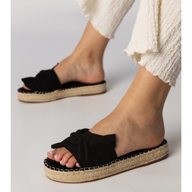 Schwarze Espadrilles mit einem Bogen 1