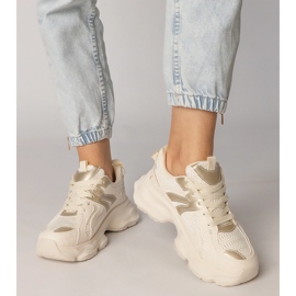 Beige Sneakers Damensport mit einer goldenen Einfügung 4