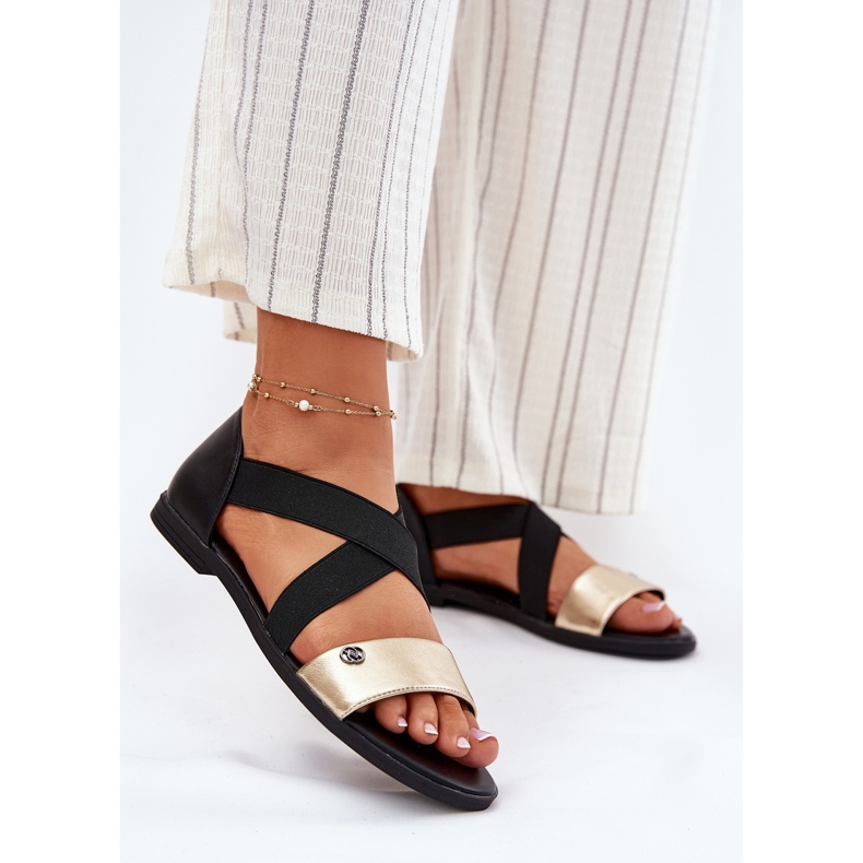 EVento Flache Frauensandalen mit flexiblen schwarzen und goldenen Streifen 2