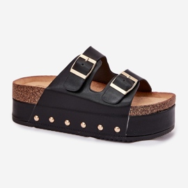 Frauenflip flops mit Schnallen auf einer massiven Plattform schwarz 1