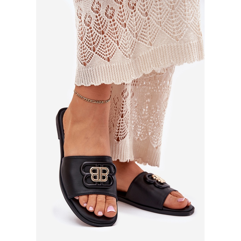 Flat -Frauen -Flip -Flops mit einem dekorativen Detail schwarz 1