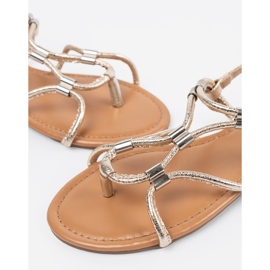 Frauensandalen flip -flip -flips mit dekorativen Streifen golden 1