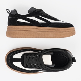 Schwarze Frauen -Turnschuhe mit weißen Einsätzen. 4