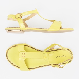 Gelbe Sandalen auf einer flachen Sohle 4