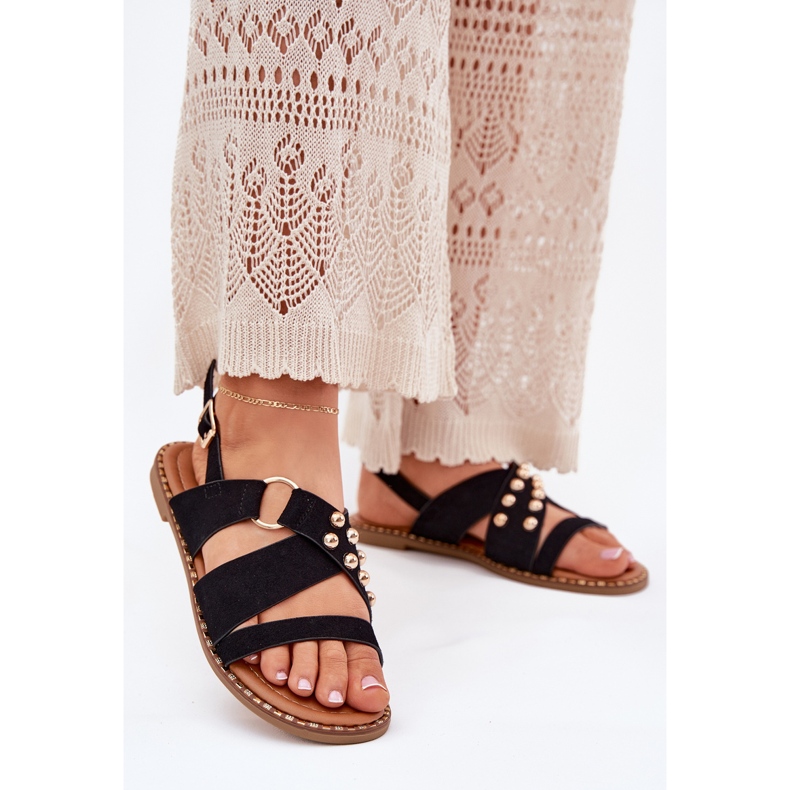 Flach -getötete Frauensandalen mit goldenen Stollen schwarz 2