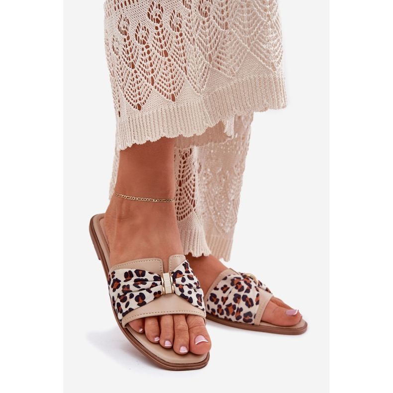 Flach -geköpfte Frauenflip -Flops mit einem Bogen Beige 1