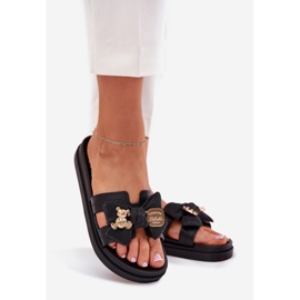 Damenschuhe mit einem Bug und einer goldenen Brosche schwarz 1