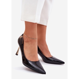 Lackierte High Heels mit einer goldenen Klemme schwarz 1