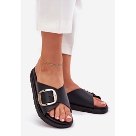 Die Flip -Flops für Frauen auf der Plattform mit einer goldenen Klemme schwarz 1