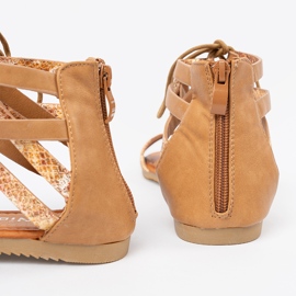 Shelvt SANADALS LACE -UP mit einem Schlangenmotiv 1