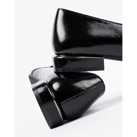 Lackierte Ladung mit einer dekorativen Sergio Leone -Klemme schwarz 1