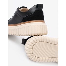 Schwarze Leder -Turnschuhe auf der Sergio Leone Beige -Plattform 1