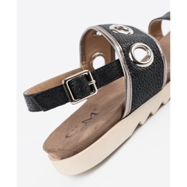 Shelvt Schwarze Sandalen mit dekorativen Metallrädern 2