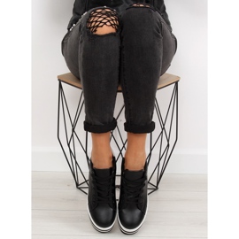 Schwarze schwarze Turnschuhe mit hoher Sohle 2