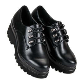 Gebundene Damenschuhe schwarz 1