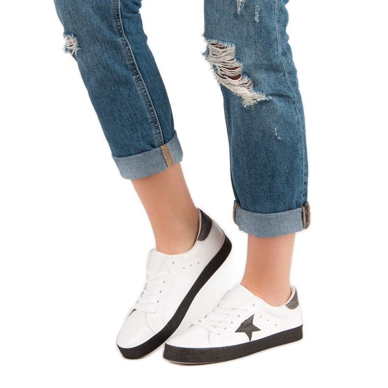 Modische niedrige Sneakers weiß schwarz 1