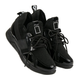 Schwarze Slip-On-Sneakers 1