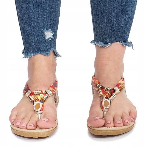 Goldene flache Sandalen mit Sprottendiamanten 1