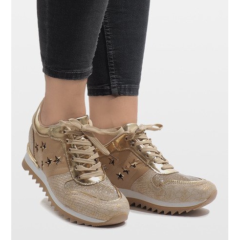 Goldene Turnschuhe auf dem Keil G-127 2