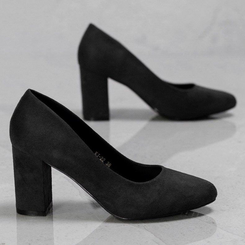 Ch. Creation Pumpen auf einer Säule schwarz 1