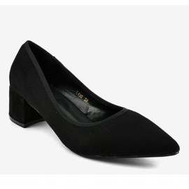 Schwarze Wildleder-Pumps an der L436-Säule 1