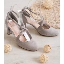 Sergio Leone Stilvolle Pumps auf einer Säule grau 2