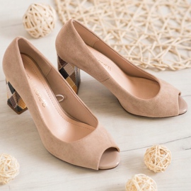 Sergio Leone Pumps mit gemustertem Absatz beige 1
