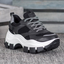 Weide Schwarze Turnschuhe auf der Plattform 1