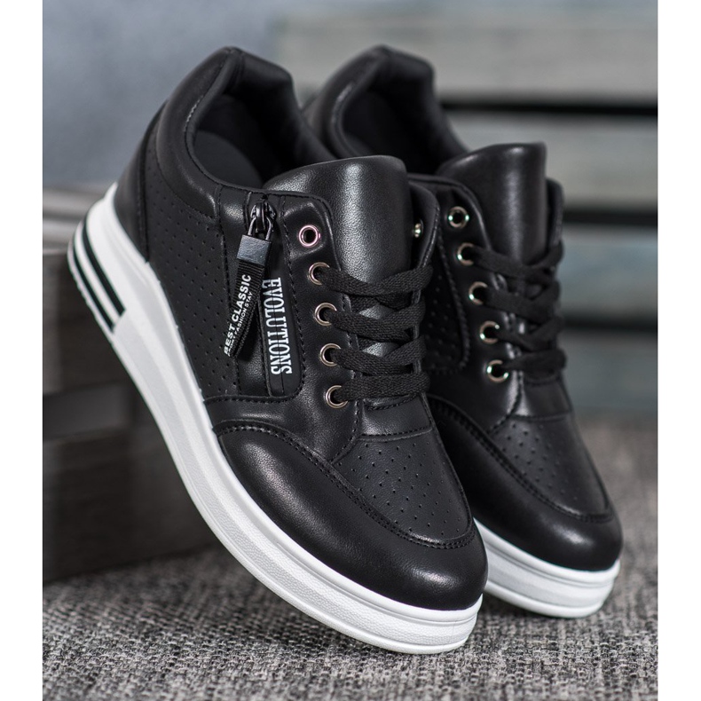 Weide Schwarze Evolutions-Turnschuhe 1