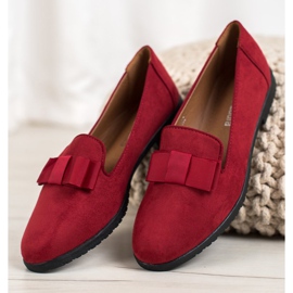 Miss Laura Lords mit einem Bogen rot 2